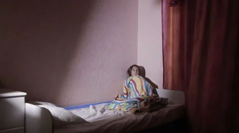 Girl under the covers in the night afraid of ghosts. nightmares. Stock Footage 68102417