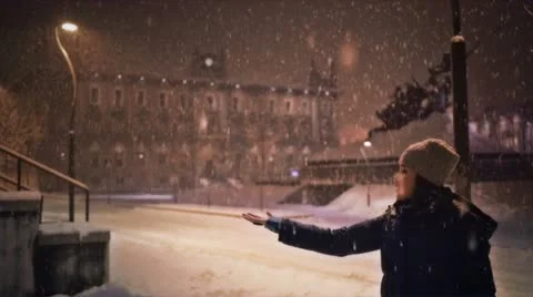 Girl under the snowfall Stock Footage 14401007