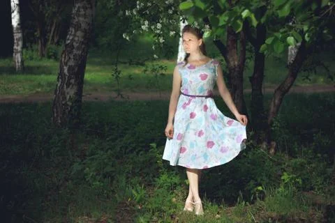 Girl under the tree Stock Photos
