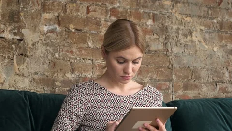 Girl Use Tablet Computer Laughing, Young Woman In home Chatting Online Stock Footage 120007700