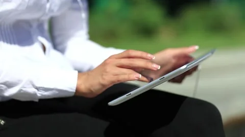 Girl uses tablet computer Video stock 86990645