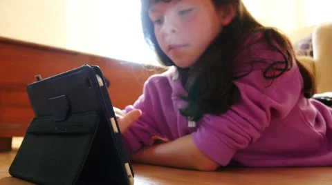 Girl uses touchscreen tablet computer, 4k, UHD Video stock 51714931
