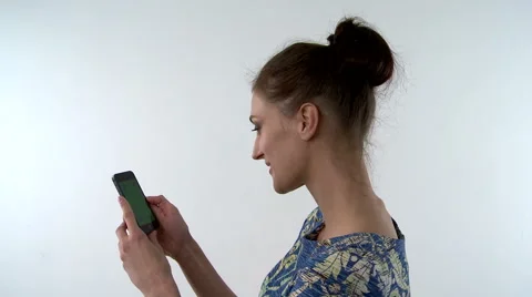 Girl using and shows smart phone Stock Footage 50910371