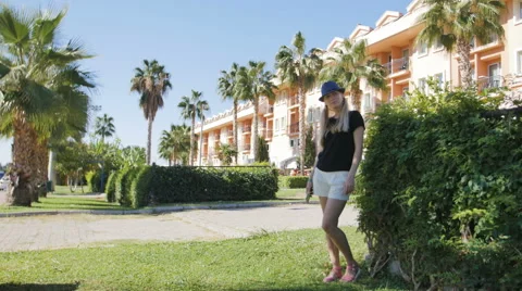 Girl using cellphone outdoors Stock Footage 68991846