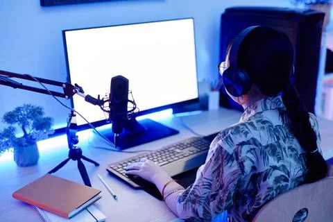Girl using Computer at Night Stock Photos