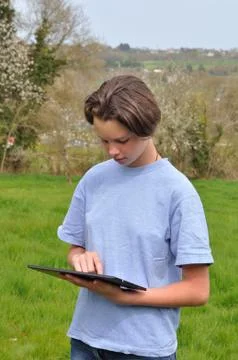 Girl using digital tablet Stock Photos