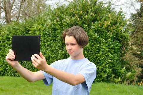 Girl using digital tablet Stock Photos