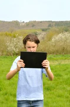 Girl using digital tablet Stock Photos
