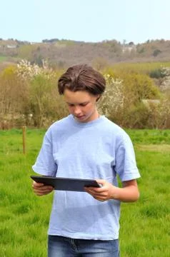 Girl using digital tablet Stock Photos