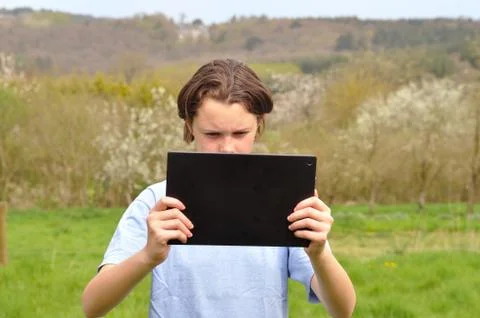 Girl using digital tablet Stock Photos