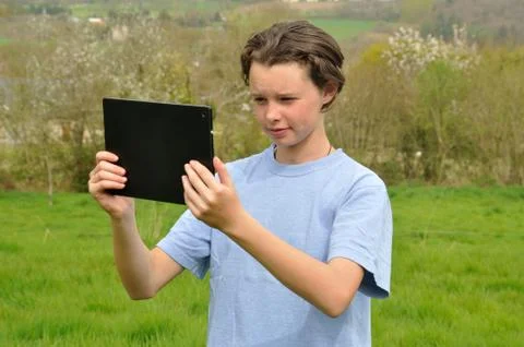 Girl using digital tablet Stock Photos