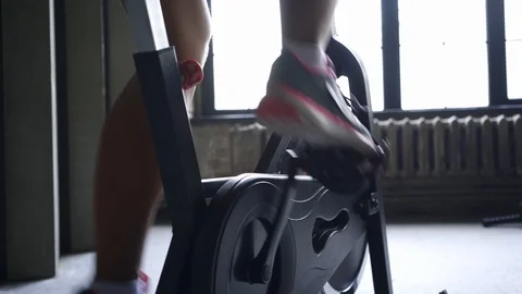 Girl using exercise equipment in modern gym Stock Footage 123073905