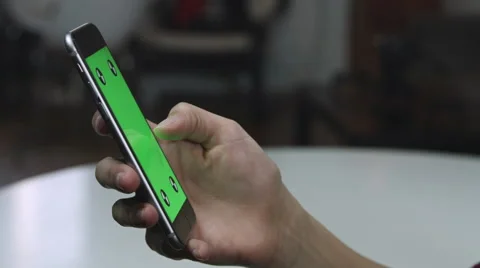 Girl Using a green screen iphone Stock Footage 59766773