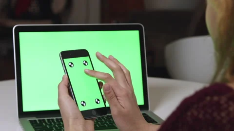 Girl Using  a green screen iphone and macbook pro Video stock 59766986