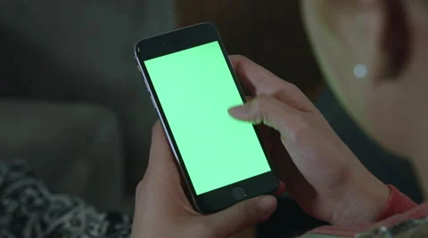 Girl Using green screen iphone Stock Footage 59771953