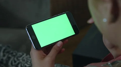 Girl Using green screen iphone Stock Footage 59775853