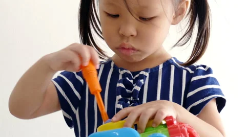 Girl using a hand screwdriver Stock Footage 64700244