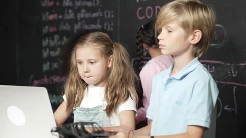 Girl using laptop programing engineering code and writing program. Erudition. Stock Footage 263017901