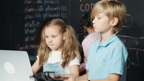Girl using laptop programing engineering code and writing program. Erudition. Stock Footage 282757502