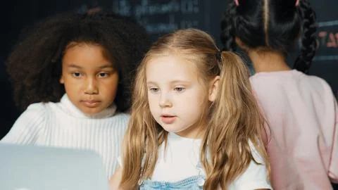 Girl using laptop programing engineering code and writing program. Erudition. Foto stock