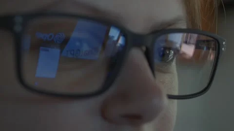 Girl using Open AI Chat GPT. Reflection in glasses. Close up. Stock Footage 241720177
