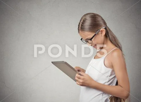 Girl Using Pad Computer