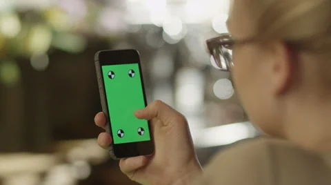 Girl Using Phone with Green Screen 2 Stock Footage
