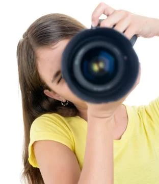 Girl using a professional camera isolated on white Stock Photos