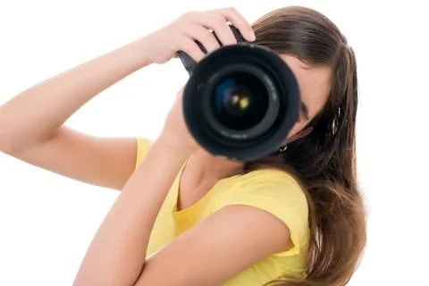 Girl using a professional camera isolated on white Stock Photos