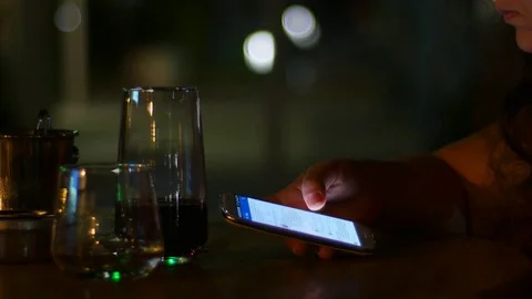 Girl Using Smart Phone in a Cafe Stock Footage 71152950