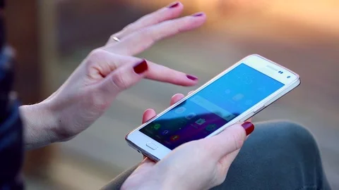 Girl Using Smartphone For Checking Instagram Stock Footage 70787419