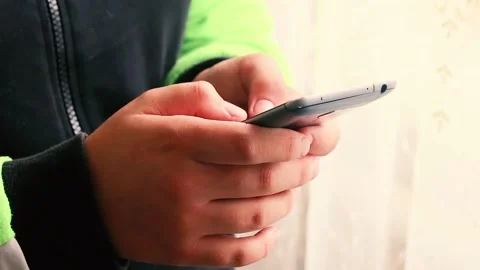 Girl using smartphone close up sliding screen, surfing internet, social media Stock Footage 164181710