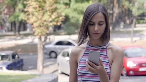 Girl Using Smartphone Stock Footage 69754196