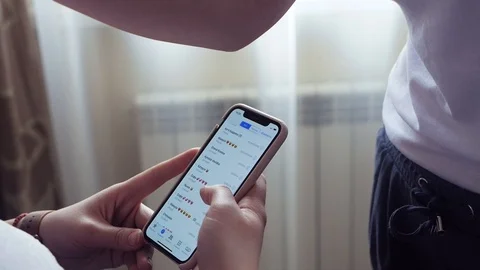 The girl is using a smartphone Stock Footage 89024876