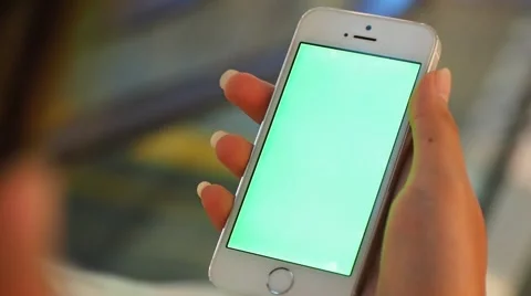 Girl Using Smartphone with Green Screen Portrait mode Stock Footage 63659383