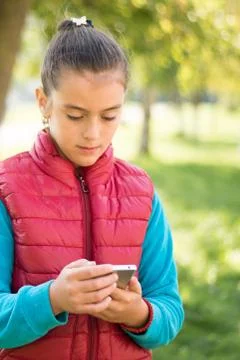 Girl using smartphone Foto stock