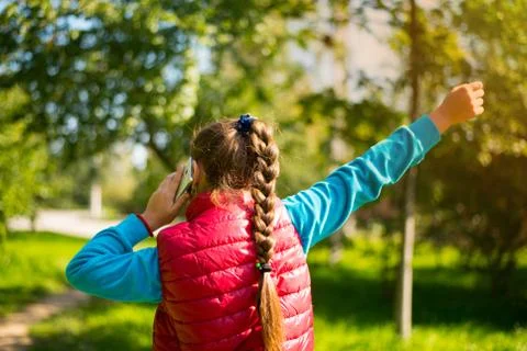 Girl using smartphone Stock Photos