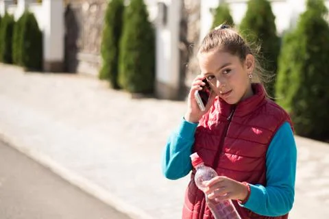 Girl using smartphone Stock Photos