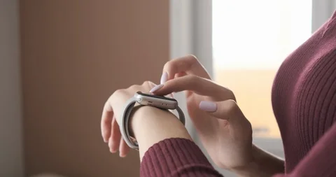 Girl using smartwatch with touchscreen at the office. Stock Footage 104406858