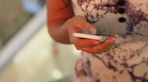 Girl Using Social App On Smart Phone on Escalator Stock Footage 63659062