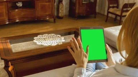 Girl Using Tablet 1 With Green Screen Stock Footage 58799204