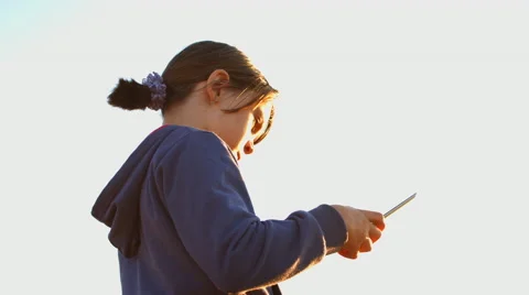 Girl using tablet PC. 4K 30fps ProRes (HQ) Stock Footage 55029809