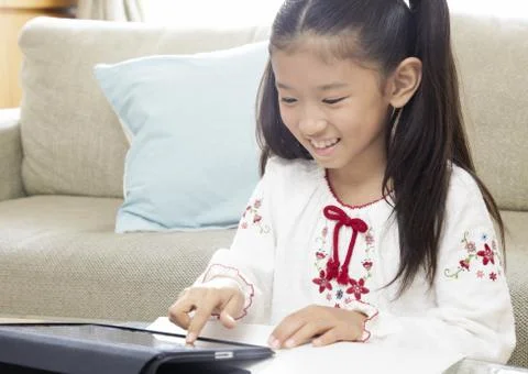 Girl using tablet PC 스톡 사진