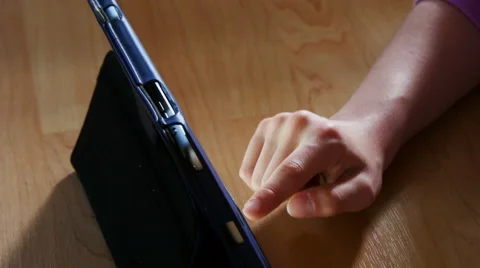 Girl using touchscreen on tablet pc, 4k, UHD Stock Footage 51719873