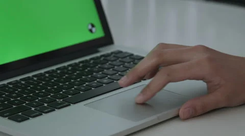 Girl Using Trackpad with Green Screen macbook pro Stock Footage 59769685