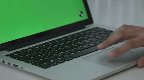 Girl Using Trackpad with Green Screen macbook pro Video stock 59769754