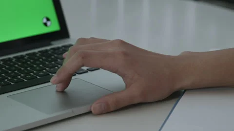 Girl Using Trackpad with Green Screen macbook pro Stock Footage 59769876