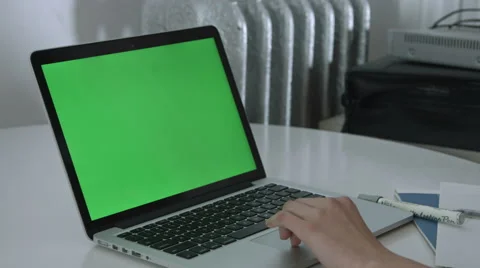 Girl Using Trackpad with Green Screen macbook Video stock 59770256
