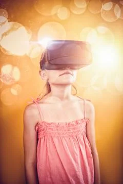 Girl using a virtual reality device on yellow background Illustrazione stock
