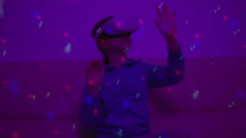 Girl Using Virtual Reality Headset And Looking Around At Interactive Technology Stock Footage 273030934